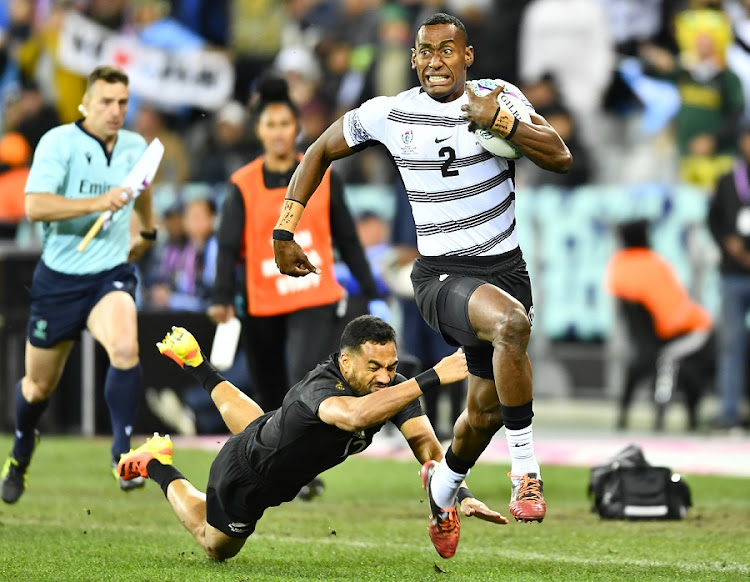 Joseva Talacolo of Fiji scores a try in the final of the Rugby World Cup Sevens against New Zealand at Cape Town Stadium on September 11 2022.