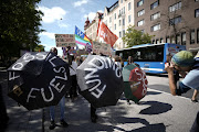 Protesters take part in the Fridays For Future climate demonstration in connection with the Stockholm +50 UN meeting, in Stockholm, Sweden, June 3, 2022. 