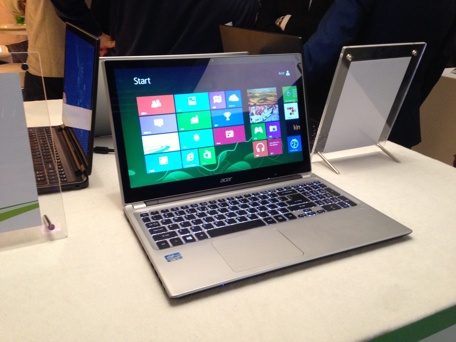 This image shows the Acer Aspire 5 Laptop in the table with open display.