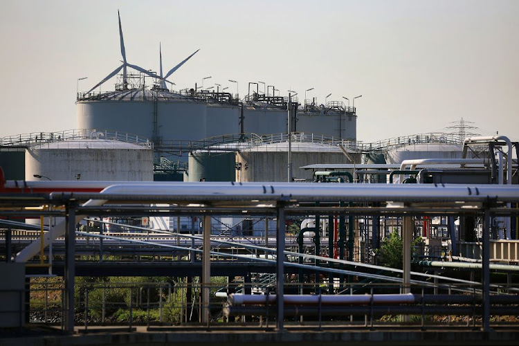 Pipelines and storage tanks at the Evos Hamburg GmbH petroleum products facility in the Port of Hamburg in Hamburg, Germany on Wednesday, August 24 2022. Picture: BLOOMBERG/KRISZTIAN BOCSI