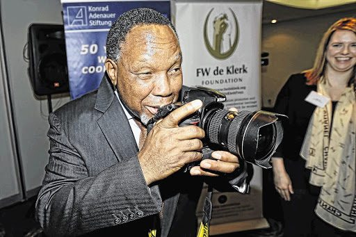 HERE'S LOOKING AT YOU: Former president Kgalema Motlanthe takes a picture of FW de Klerk during an event to commemorate the latter's February 2 1990 speech which signalled the end of apartheid