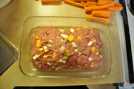 I mixed the meat, cheese, vegetables.  Peeled carrots. Before baking.