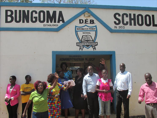 Parents, Teachers and family members of Tatiany Wabwire at Bungoma DEB on Tuesday during celebrations. /BRIAN OJAMAA