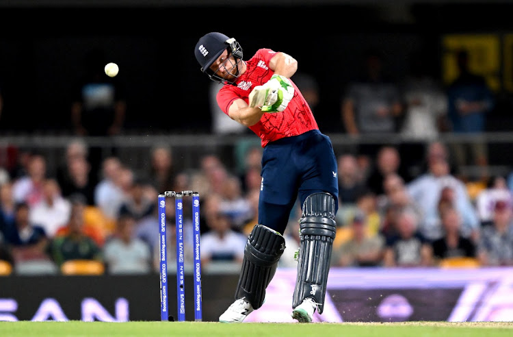 Jos Buttler of England hits the ball to the boundary for a four during the ICC Men's T20 World Cup match between England and New Zealand at The Gabba on November 01, 2022 in Brisbane, Australia.