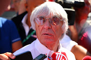 MONZA, ITALY - SEPTEMBER 06:  F1 supremo Bernie Ecclestone speaks with members of the media in the paddock before the Formula One Grand Prix of Italy at Autodromo di Monza on September 6, 2015 in Monza, Italy.  (Photo by Bryn Lennon/Getty Images)