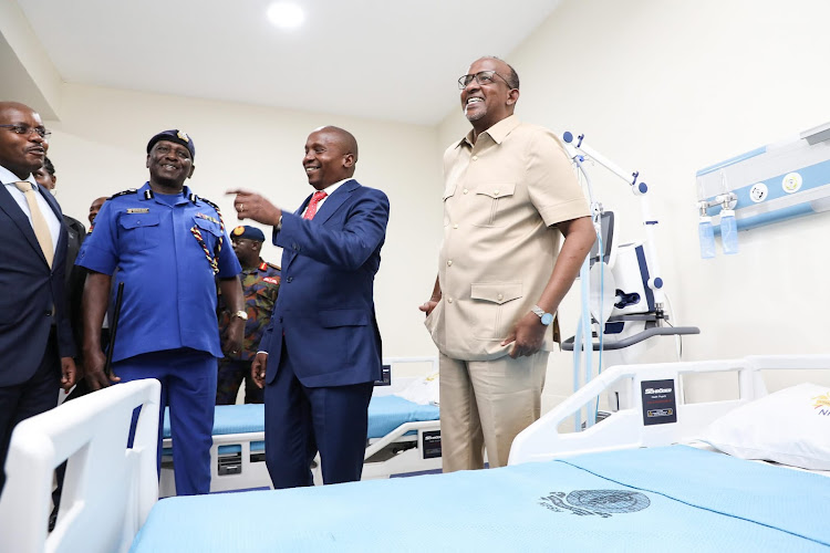 Defence CS Aden Duale and Interior CS Kithure KIndiki during touring the hospital wards during the handover of the National Police Service Level 4 Hospital along Mbagathi Way on May 17, 2024.