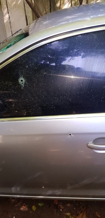 One of the robbery victims' vehicle with bullet holes in Kisumu.