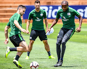 Bafana Bafana players Dean Furman (l), Bradley Grobler (c) and Lebogang Manyama during their training session at Sturrock Park in Johannesburg on Monday.