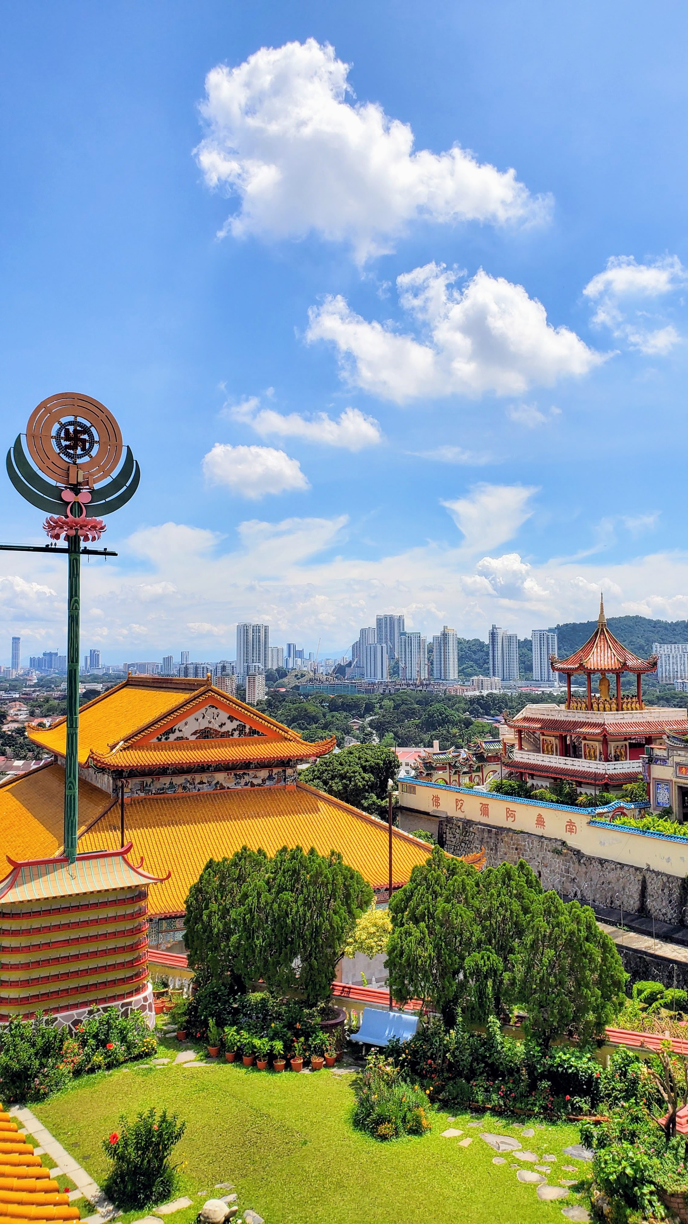 Visiting Kek Lok Si: What makes it unique is that among its millions of Buddhas it shows the blending of cultures that is so representative of Malaysia by including many stylistic representations of Buddha.