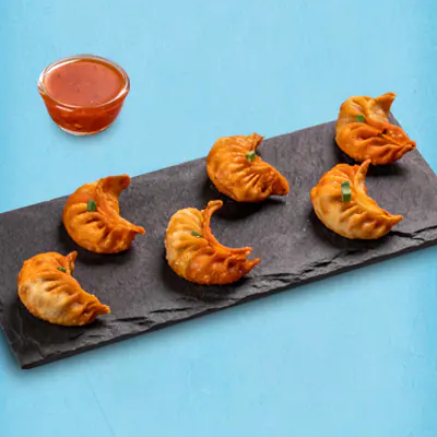 Fried Schezwan Chicken Momos With Momo Chutney