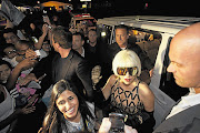 Lady Gaga greets throngs of fans on arrival at Lanseria airport, northwestern Johannesburg. File photo.