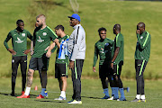 Assistant  coach Molefi Ntseki (white top)  and Bafana Bafana players at  training last week before they departed for Dubai where they are preparing for the Afcon finals. 