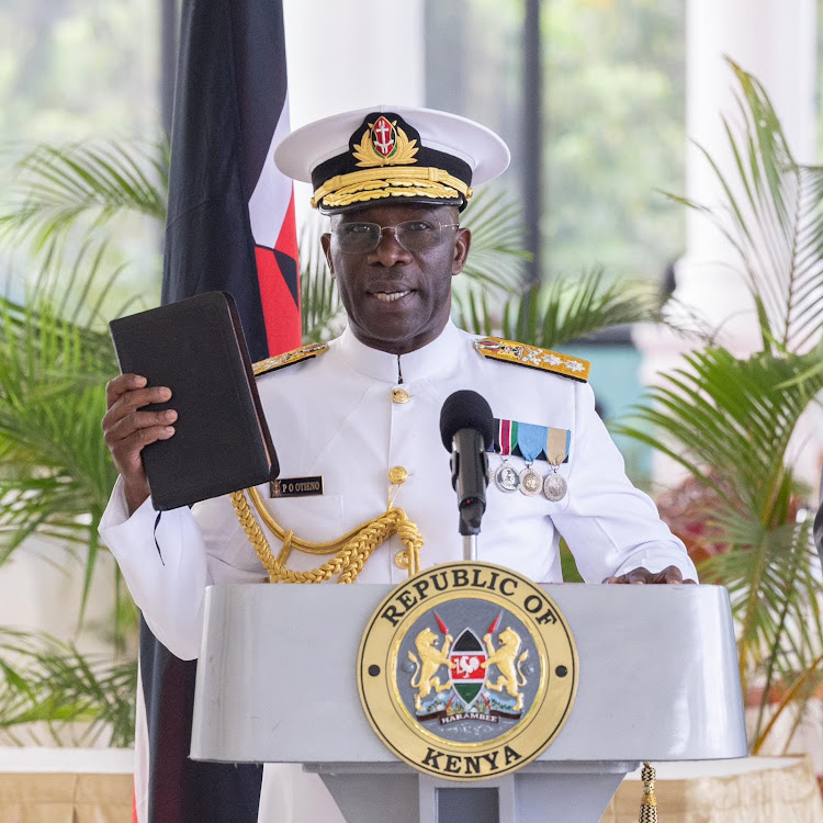 The new National Defence University Vice Chancellor of Administration and Finance Maj General Thomas Ng'ang'a takes oath of office during the swearing in ceremony at State House, Nairobi, on May 3, 2024.