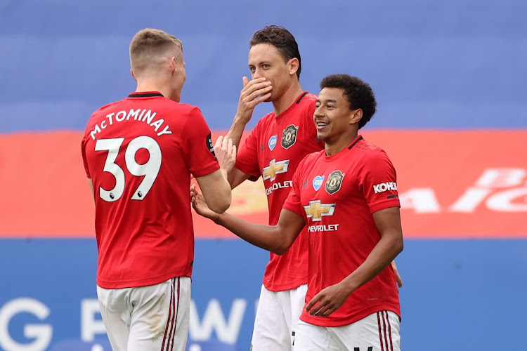 Manchester United's Jesse Lingard celebrates with Scott McTominay and Nemanja Matic after scoring against Leicester City on Sunday