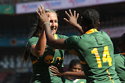 Libbie Janse van Rensburg of South Africa congratulates Ayanda Malinga after she scored the opening try during the Women's Winter Series 1st Test against Spain Women at Ellis Park in Johannesburg.