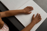 South Africa’s copyright laws prohibit books being published in Braille or other formats accessible to people who are visually impaired without the author or publisher’s permission. Stock photo.