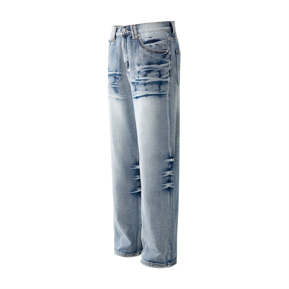 Pantalon de travail en jean denim avec dégradé de lavage industriel. Résistant, durable, idéal pour l'industrie lourde, look moderne, et confortable à porter.