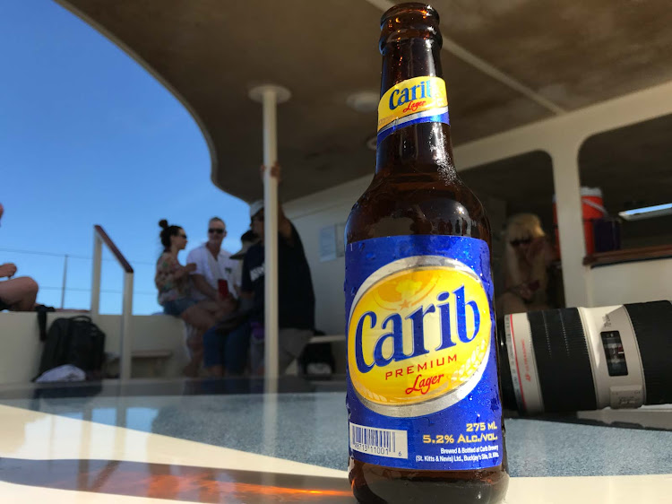 Carib beer served during a catamaran outing in the waters of St. Kitts. 