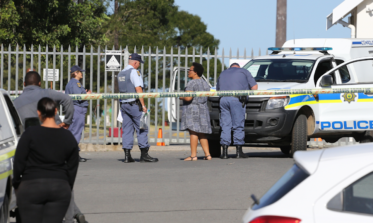 The scene outside Voorpos Primary School where a woman was shot and killed.