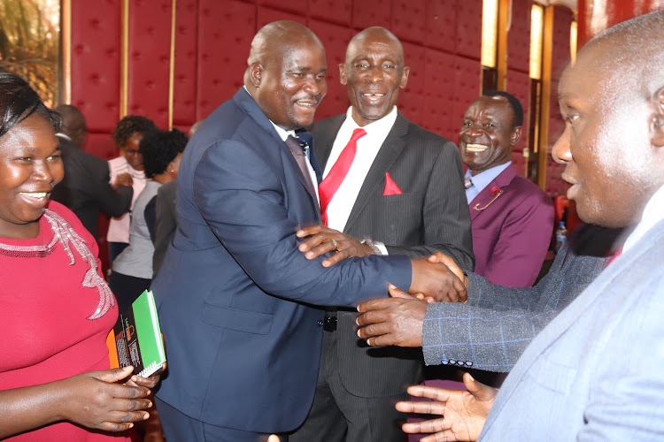 Kwambwai MCA Richard Ogindo with some of his colleagues at the Homa Bay county assembly on September 22,2022