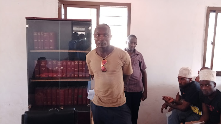 Police Constable Rodgers Ouma, who is attached to the Lamu Administration Police line in Lamu town, when he appeared in court on Monday.