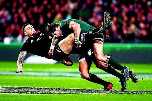 Springboks' Jan Serfontein tackles All Blacks' Sonny Bill Williams during their Championship clash in New Zealand a fortnight ago. / Hannah Peters/Getty Images