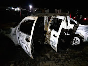 One of the two vehicles which were torched at KZN Cogta's provincial disaster management centre in Pietermaritzburg on Thursday evening. 