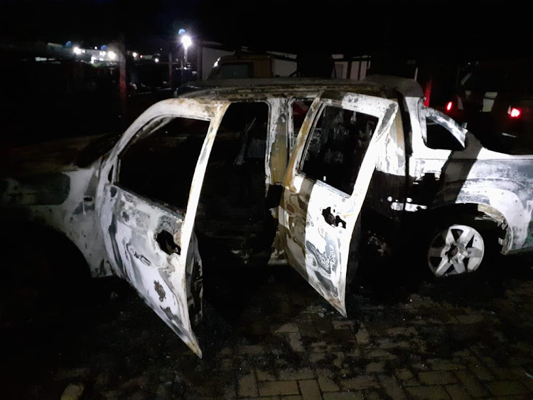One of the two vehicles which were torched at KZN Cogta's provincial disaster management centre in Pietermaritzburg on Thursday evening.