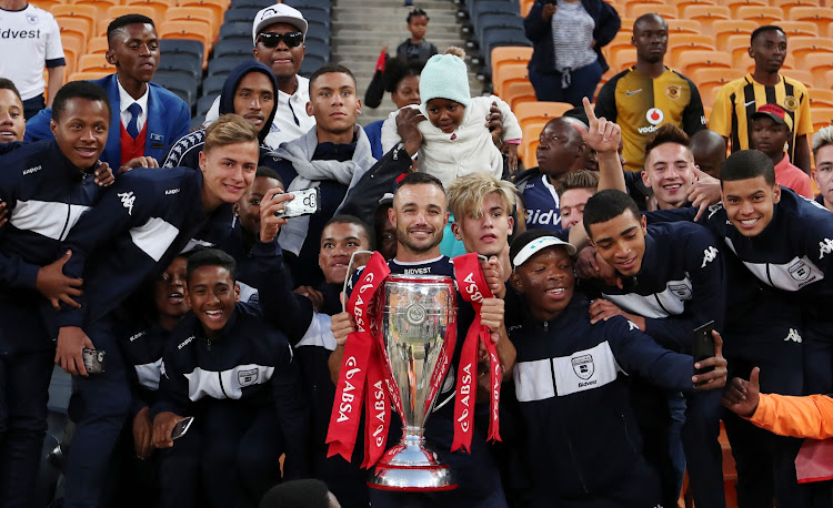 Bidvest Wits development coach Dillon Sheppard celebrates with club's Academy players as Wits were crowned the 2016/2017 Absa Premiership Champions.