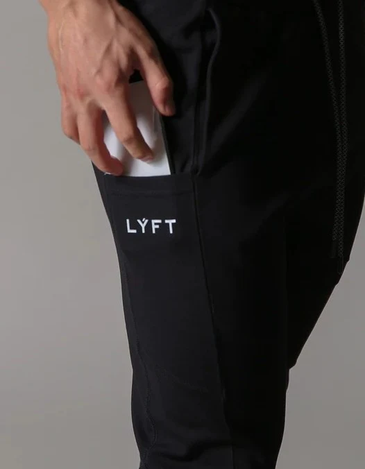 Men's Invisible Zip Pocket Sports Pants. Stay comfortable and secure during workouts and activities. Discreet design, ul