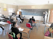 A teacher at Thoho-Ya-Ndou Primary in Saulsville, Pretoria, attends to his duties yesterday. / Shonisani Tshikalange