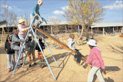 BLUNDER:  Blind and partially sighted pupils at the  Siloe School for the Blind   at Thokgwaneng village in GaChenue, Limpopo, received regular  textbooks  intended for use   by   sighted pupils instead  of getting books in  Braille. The   textbooks in  Braille are still being   adapted  by publishers in collaboration with the department of education, a spokesman said.
       PHOTO: ELIJAR MUSHIANA