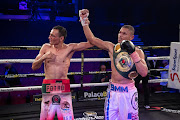 Newly crowned IBO champ Ludumo Lamati, right, poses with Jose Martin Estrada Garcia of Mexico.