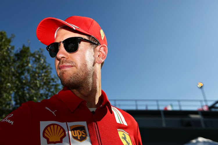 Sebastian Vettel of Germany and Ferrari walks in the Paddock during previews ahead of the F1 Grand Prix of Australia at Melbourne Grand Prix Circuit on March 12, 2020 in Melbourne, Australia.