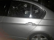 Two gunmen opened fire on Johnson Mdaka's car as he arrived home with his wife and daughter.