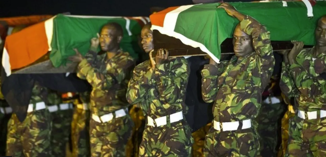 KDF soldiers carry caskets bearing the remains of their colleagues killed during the El Adde attack in 2016.