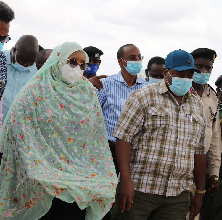 Ijara MP Sophia Abdinoor and Water PS Joseph Irungu during an inspection tour of Masalani water project in Garissa