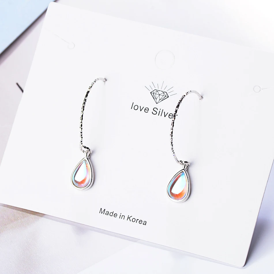 Boucles d'oreilles courtes allongées dégradé pierre de lune pour femmes, subliment votre style avec élégance et ajoutent une touche sophistiquée.
