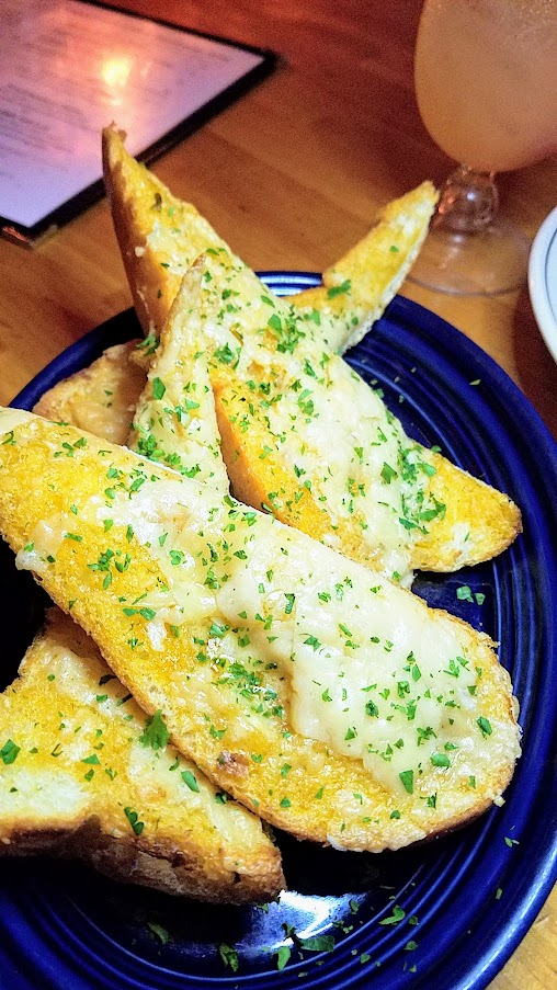 Tapalaya PDX, Toasted Vietnamese Baguette with Charred green onion butter and parmesan