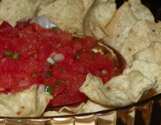 Serve salsa with tortilla chips.