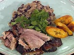 Puerto Rican-Style Roasted Pork Shoulder with Rice and Black Beans and Fried Sweet Plantains was pinched from <a href="http://www.foodnetwork.com/recipes/emeril-lagasse/puerto-rican-style-roasted-pork-shoulder-with-rice-and-black-beans-and-fried-sweet-plantains-recipe.html" target="_blank">www.foodnetwork.com.</a>