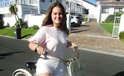 Marelize Horn on her bike in Windhoek after falling off it won her global fame.