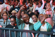 Music lovers enjoying themselves at the Standard Bank Joy of Jazz