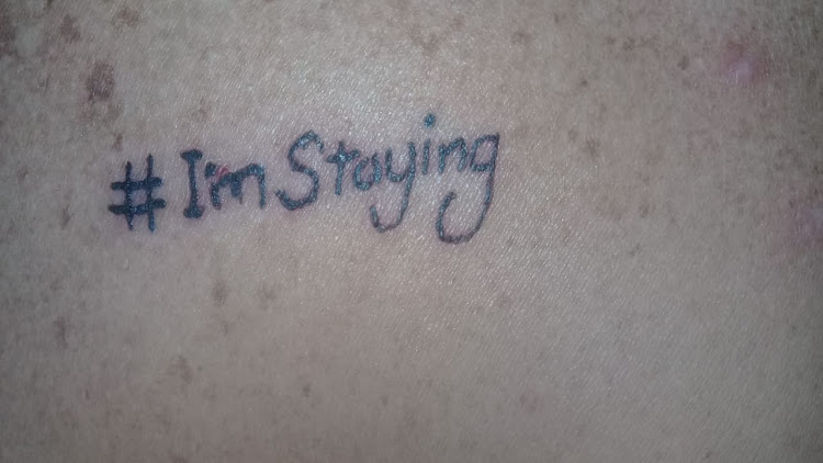 A supporter of the #Imstaying movement has taken a further step in her cause by getting a tattoo to raise awareness about the beauty of the country.