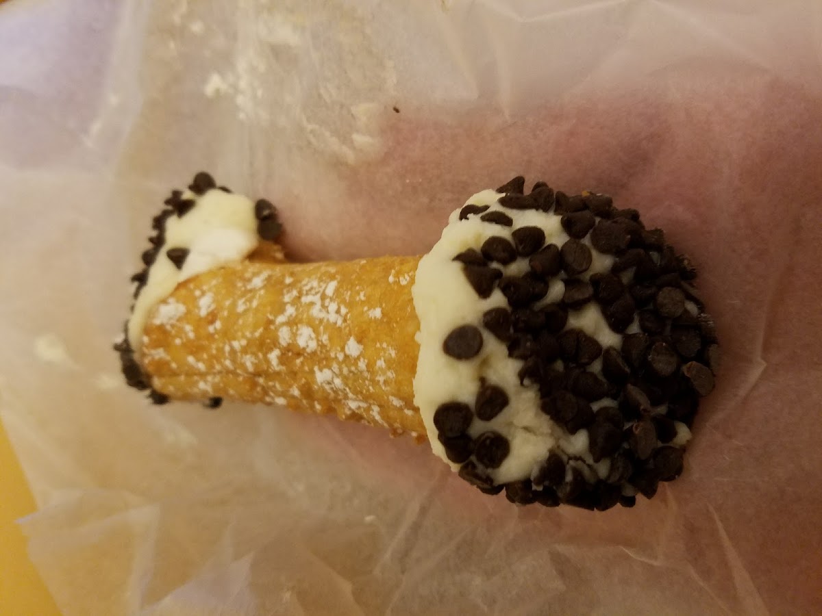 Gluten free ricotta cannoli. This was my 2nd stop here. She suggested I buy a cannoli. I told her I tried one (whip cream) and didn't love it. She gave me this one for free. It was very good!