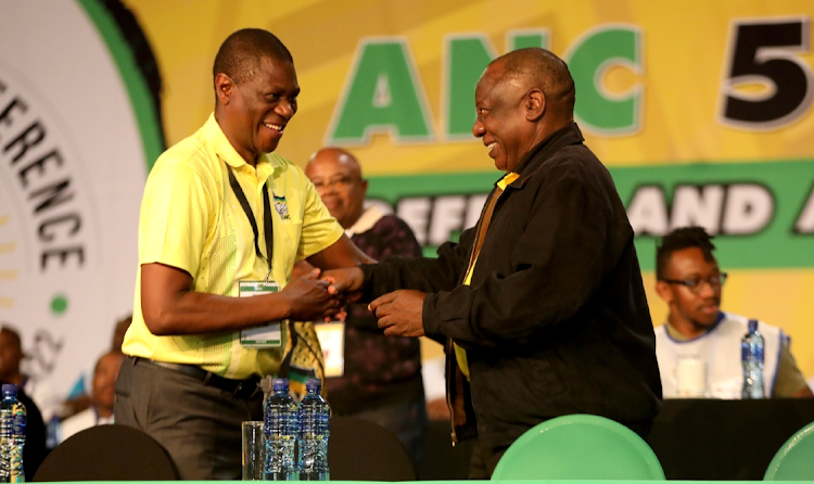 ANC president Cyril Ramaphosa congratulates his new deputy Paul Mashatile at the party's national conference in December. File image
