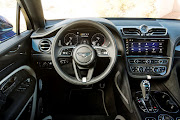 The interior mirrors that of the lesser V8 model. The new 10.9-inch touchscreen infotainment system offers impressive connectivity. 