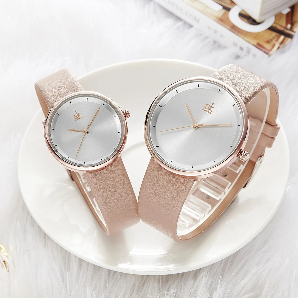 Title 2, Montre de couple Sheng Carved K8040, design élé...