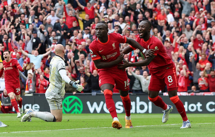 Liverpool's Sadio Mane celebrates scoring a goal with Naby Keita before it is disallowed.