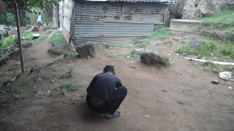 Wandile Shelembe used to play in the yard while his sister went to school - now he has finally been admitted to grade 1.